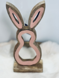Roze houten konijn
