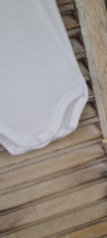 1184 Babidu romper korte mouw polokraag wit