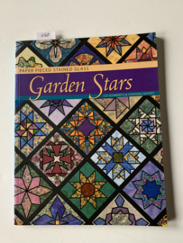 Paper Pieced Stained Glass Garden Stars | Liz Schwartz and Stephen Seifert |  1e druk | 2001 | Uitgever: Zippy Designs Publishing Inc. | ISBN 978-1891497056 | Engelstalig |