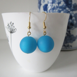 Goudkleurige blauwe oorbellen