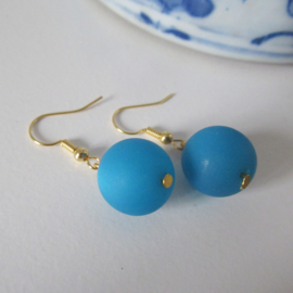 Goudkleurige blauwe oorbellen