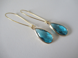 Goudkleurig aqua blauw  oorbellen.