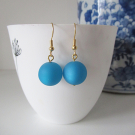 Goudkleurige blauwe oorbellen