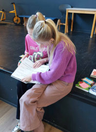 Ganzenbord boekenspel met opdrachten