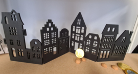 Houten dorp zwart