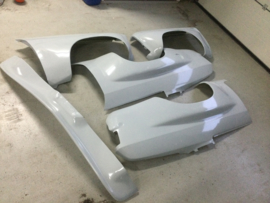 Opel Ascona A wide extension front and rear fenders and front spoiler.