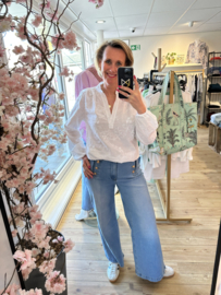 Gemma Ricceri - stretchy jeans met gouden knopen