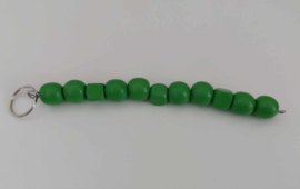 Kralen slinger 18 cm. met groene kralen