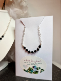 Zilveren hartjesketting-armband met zwarte spinel kraaltjes