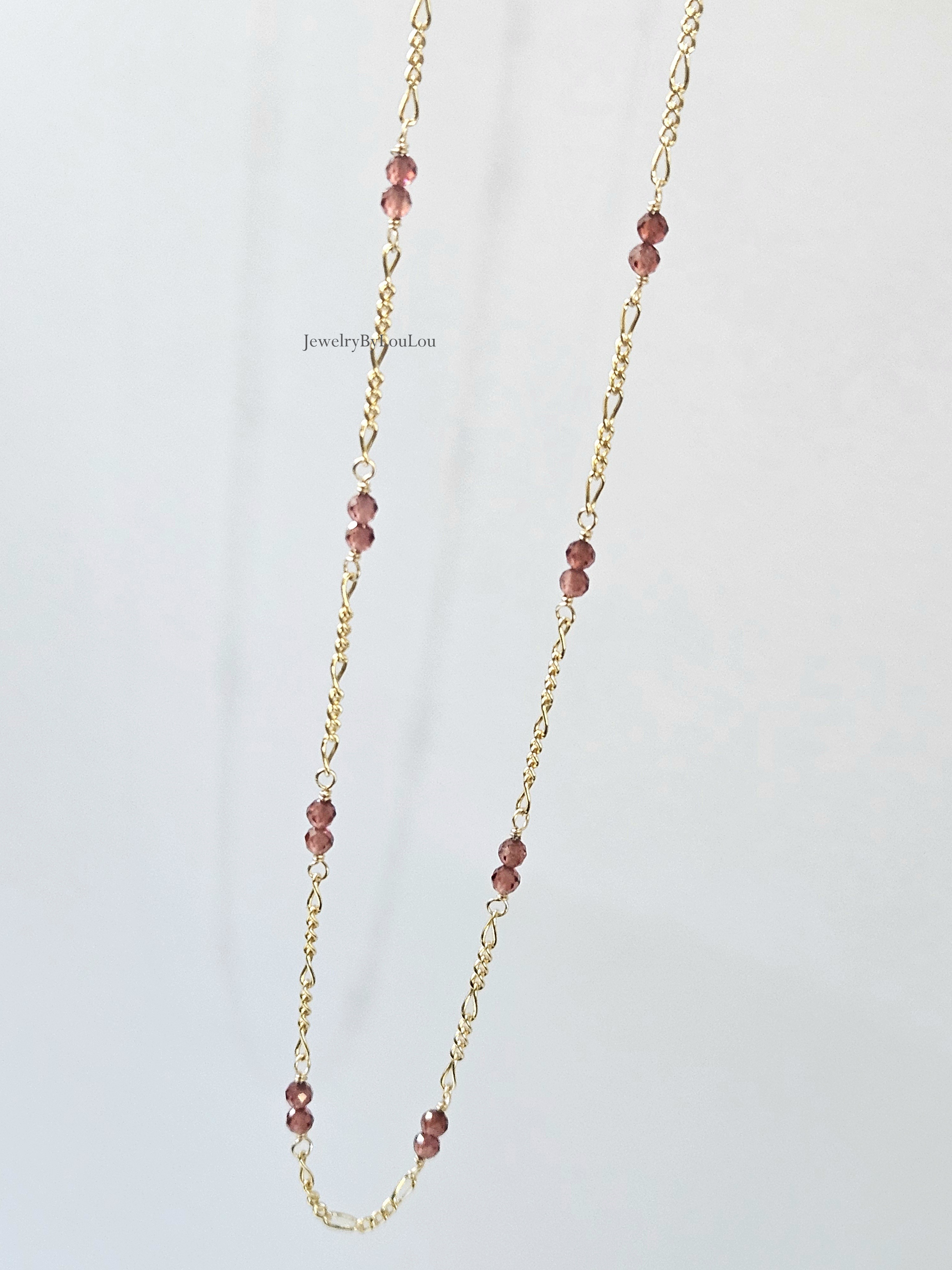 Figaro schakelketting met Malaya granaat 14k goldfilled - 925 sterling zilver