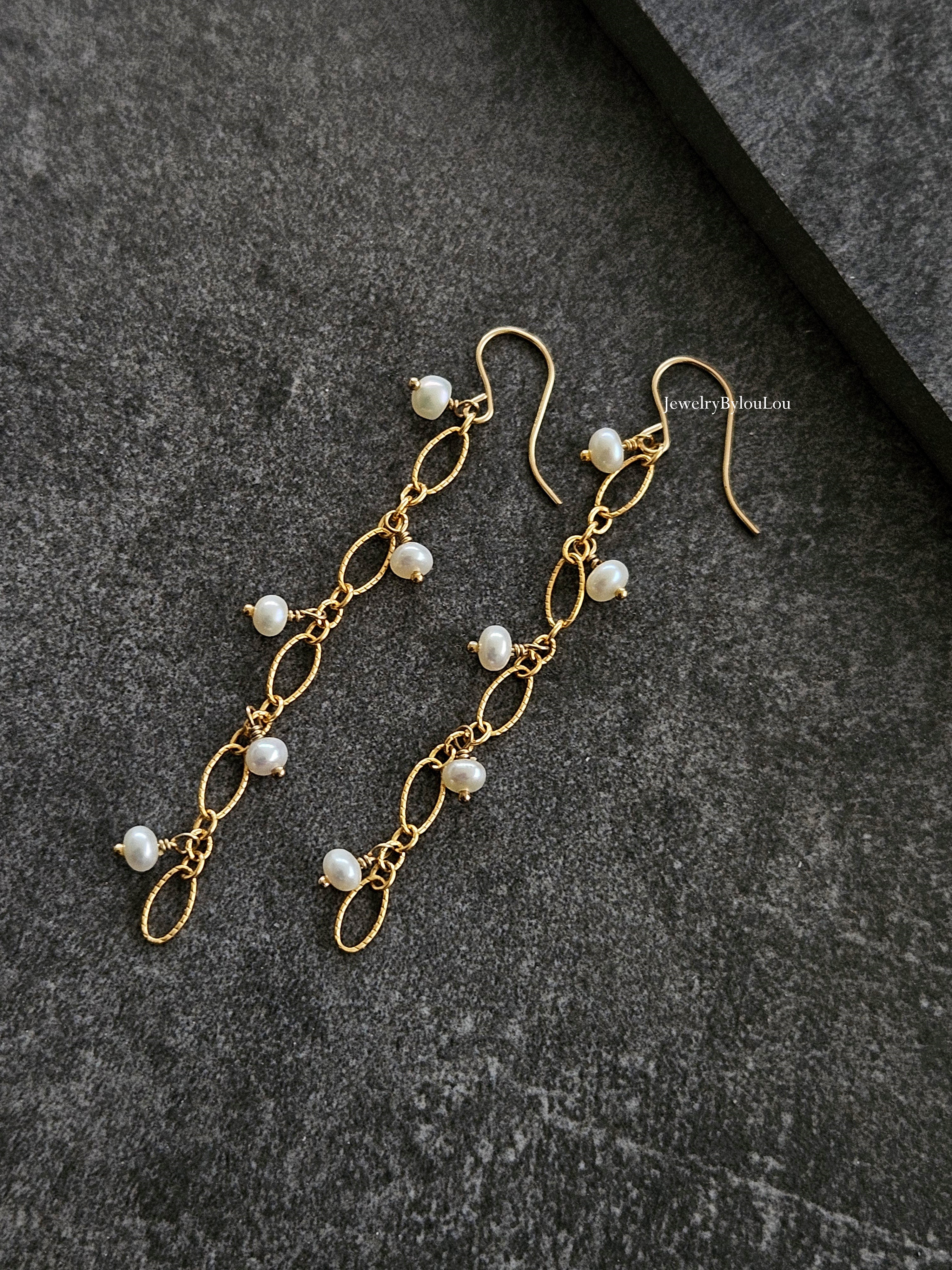 Lange fijne zoetwaterparel oorbellen  14k goldfilled & 925 sterling zilver