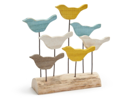 Vogels op houten blok