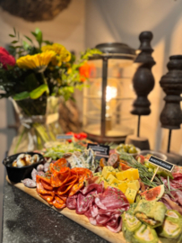 Tapasplank: crackers met cava