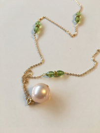 goudroze parelketting met peridot