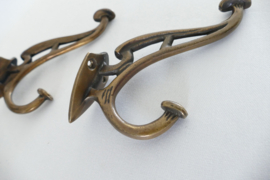 A pair of Art Nouveau coat hooks