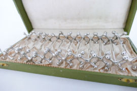 A set of 12 Silver Plated Art Deco Knife rests - Belgium, 1930-1940