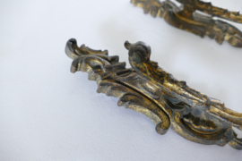 A pair of antique gilded curtain hooks - France, late 19th century