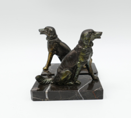 Een paar Art Deco boekensteunen in Zamac, in de vorm van Flat Coated Retrievers - c. 1930