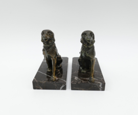 Een paar Art Deco boekensteunen in Zamac, in de vorm van Flat Coated Retrievers - c. 1930