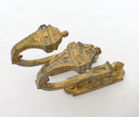 A pair of French curtain hooks, so-called Embrasses