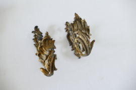 A pair of antique gilded curtain hooks - France, late 19th century