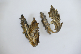 A pair of antique gilded curtain hooks - France, late 19th century