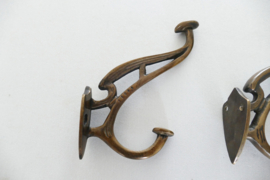 A pair of Art Nouveau coat hooks