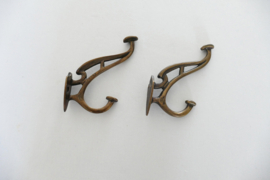 A pair of Art Nouveau coat hooks