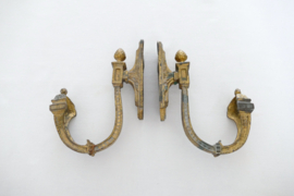 A pair of French curtain hooks, so-called Embrasses