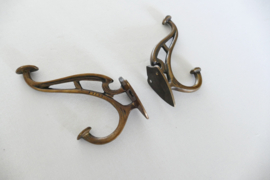 A pair of Art Nouveau coat hooks