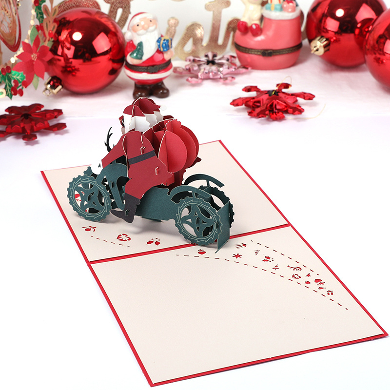 3D Pop-up Christmas card Santa Claus on a motorbike