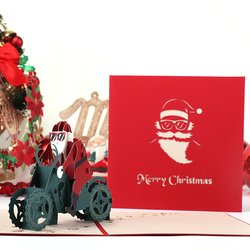 3D Pop-up Christmas card Santa Claus on a motorbike