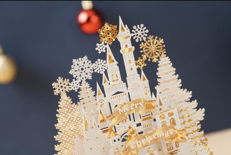 3D Pop-up gold and white Christmas card with snowflakes and Christmas tree