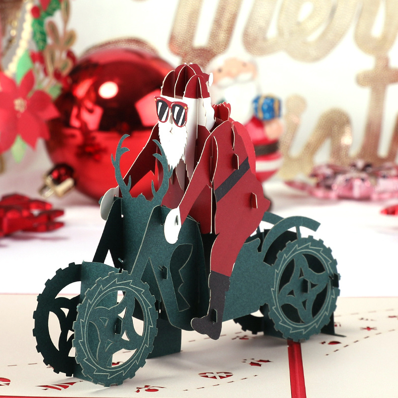 3D Pop-up Christmas card Santa Claus on a motorbike