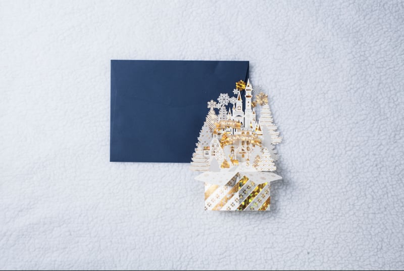 3D Pop-up gold and white Christmas card with snowflakes and Christmas tree