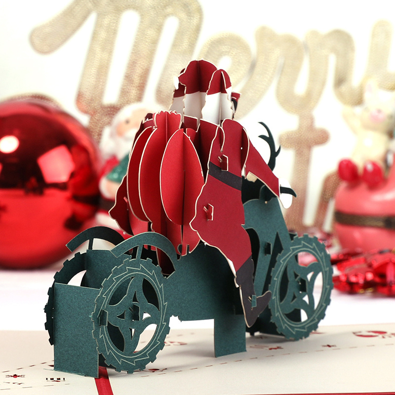 3D Pop-up Christmas card Santa Claus on a motorbike