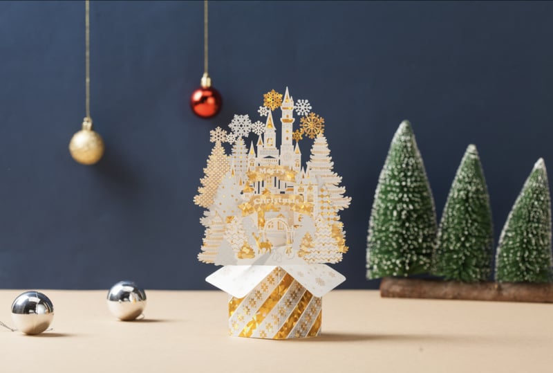 3D Pop-up gold and white Christmas card with snowflakes and Christmas tree