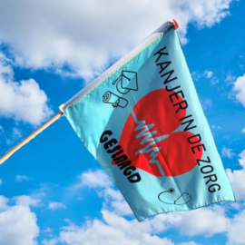 Vlag  geslaagd Zorgkanjer
