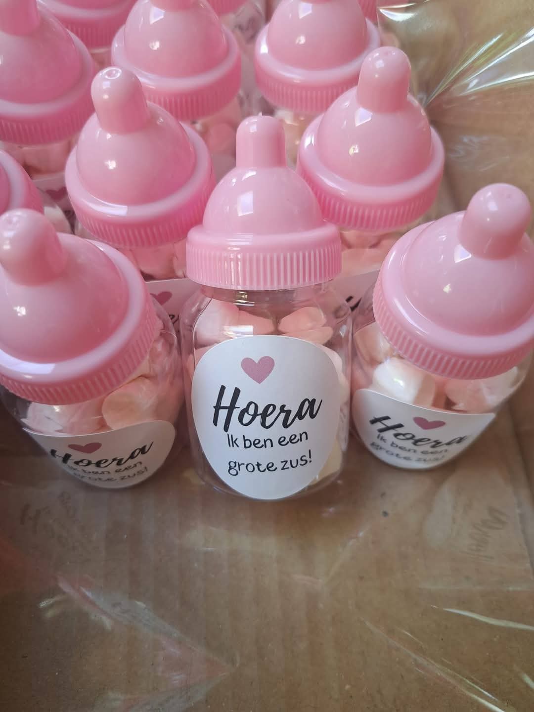 Papflesje gevuld met roze/witte mini spekjes