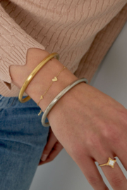 Armbandje roestvrijstaal hartjes goud