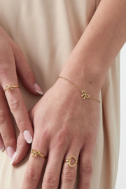 Armbandje roestvrijstaal strik goud