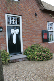 Grote linnen decoratie strik roomwit