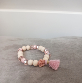 Kralen armbandje met bloemetje en kwastje