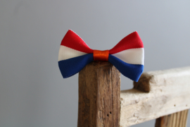 Gouden houten kralen ketting met strikje rood-wit-blauw-oranje