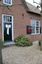 Grote linnen decoratie strik roomwit