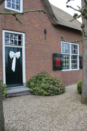 Grote linnen decoratie strik roomwit