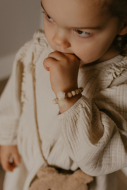 Kralen armbandje met pompom en kwastje offwhite