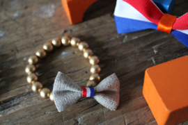 Gouden houten kralen armbandje met strikje Linnen en rood-wit-blauw