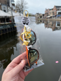 Zonnebril "Dankzij u zagen we dit schooljaar alles door een zonnige bril”