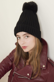 Gebreide muts met Pompon